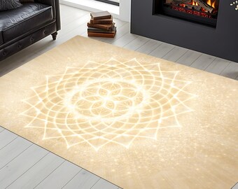May include: A rectangular beige area rug with a glowing white geometric mandala design. The rug is placed on a light wood floor, with a black leather sofa and fireplace in the background. The rug's design is symmetrical and intricate.