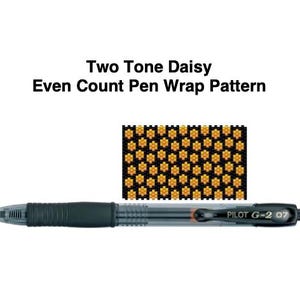 May include: A black and clear Pilot G-2 07 pen with a black grip and a small, colorful, daisy-patterned design. The text "Two Tone Daisy Even Count Pen Wrap Pattern" is displayed above the pen and design.