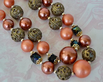 Vintage Necklace with Two Strands of Copper Colored Plastic Beads and Metal and Dark Glass Beads Made in Japan
