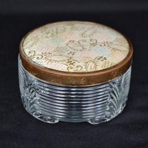 Vintage Powder or Storage Jar with Clear Glass Bottom and Metal Lid with Plastic Over Fabric