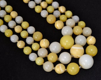 Vintage Necklace with Three Strands of Plastic Off White and Yellow Beads Made in Japan