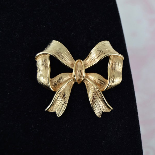 Vintage Bow Brooch Made of Gold Tone Metal
