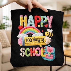 May include: Black tote bag with colorful embroidered design. Features the words "HAPPY SCHOOL" and "100 days of" with a rainbow, pencil, bee, apple, stars, and a backpack. The design is in bright colors.