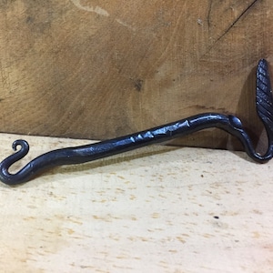 Hand forged leaf/hook bottle opener