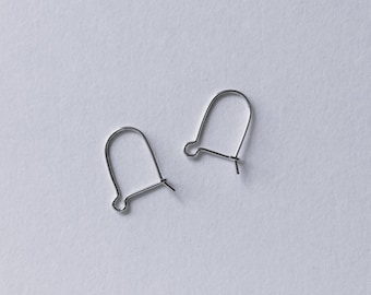 Par de alambres de seguridad de plata para pendientes colgantes.