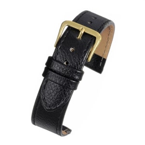 May include: Black leather watch strap with a gold buckle.