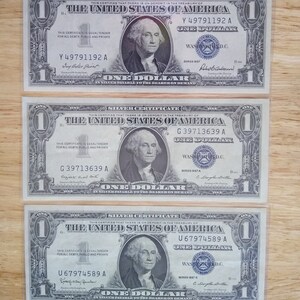 3 of Series 1957 Plain, A and B One Dollar Silver Notes