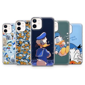 May include: Five phone cases with Donald Duck designs. The cases display illustrations of Donald Duck in various poses and settings, using blue, white, and yellow colours. The cases are for a mobile phone.