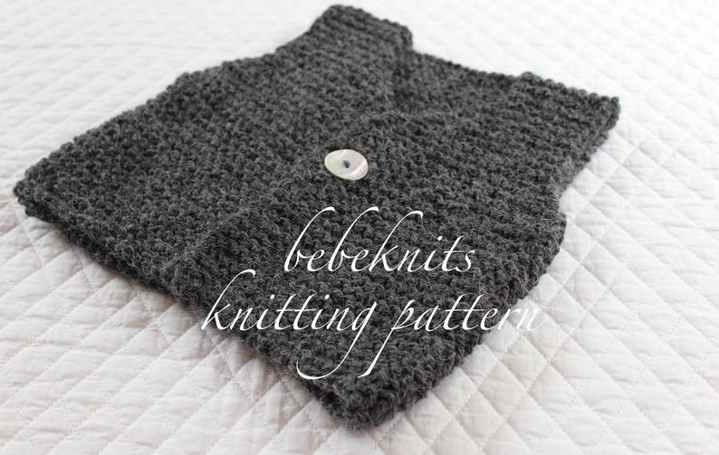 May include: A grey knitted waistcoat with a button fastening. The waistcoat is made with a textured stitch and has the text "bebeknits knitting pattern" on it.