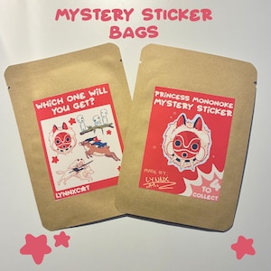 May include: Two brown paper bags with red and white stickers. One sticker says "Which one will you get?" with cartoon characters. The other says "Princess Mononoke Mystery Sticker". The text "Mystery Sticker Bags" is at the top.