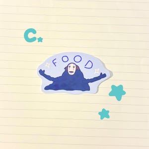 May include: A sticker featuring a blue character with outstretched arms, the word "FOOD" above it, and a white face. The sticker is surrounded by light blue stars and the letter "C".