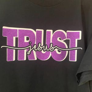 Trust Jesus T-Shirt | Christian Bible Verse Shirt with Acts 16:31 | Glitter Faith Shirt | Custom Color Religious Tee