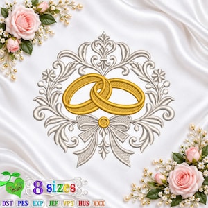 Puede incluir: Un diseño de bordado con dos anillos dorados entrelazados en el centro de una corona y un lazo de filigrana plateada. El diseño está rodeado de rosas rosadas y detalles florales blancos. El texto inferior indica 8 sizes y formatos.