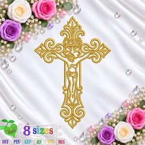 May include: A gold-coloured machine embroidery design of a crucifix featuring ornate scrollwork and the word JESUS at the top. The design is centred on a white satin background decorated with pink, white, and purple roses and clear crystals.