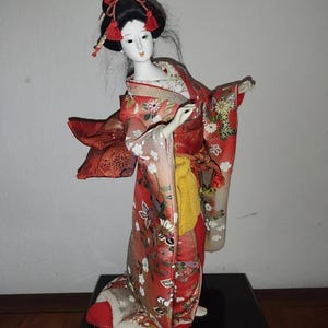 Japanese Geisha. Doll figure traditional dress.