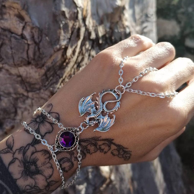 Handmade dragon cuff bracelet with intricate detailing, adjustable size, perfect for fantasy dragon jewelry lovers, gothic silver bracelet, and unique gift for dragon enthusiasts.