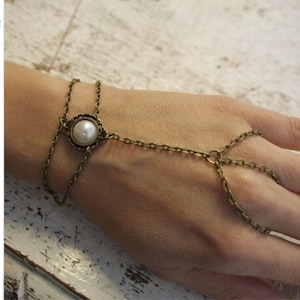 Chain slave bracelet . Hand armour bracelet