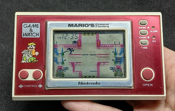 Vintage Consola Nintendo Game & Watch Modelo N•ML-102 Mario's Cement Factory Made in Argentina