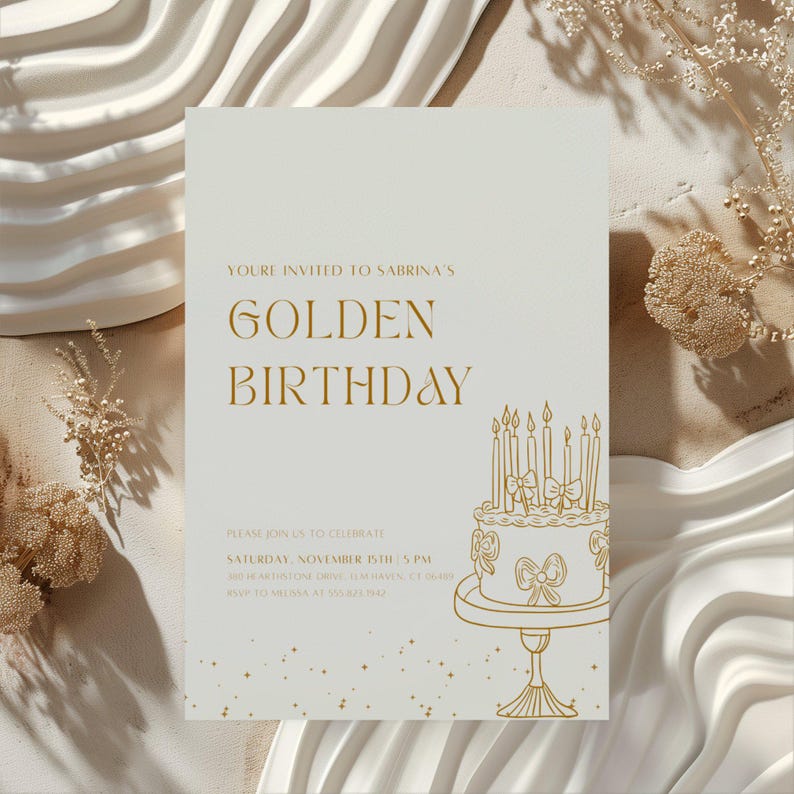 May include: A cream-colored birthday invitation with gold text and a cake illustration. The text reads "GOLDEN BIRTHDAY" and includes event details. The design features a cake with candles and decorative elements.