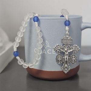 Handmade Rosary with glass beads, Pardon crucifix with Miraculous Medal, and St. Benedict Medal.