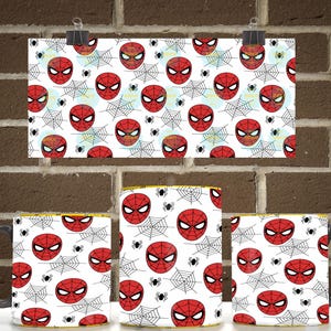 May include: A white ceramic mug featuring a repeating pattern of red and black Spider-Man masks interspersed with black spider web illustrations and small black spiders. The mug has a dark handle and a yellow interior rim, showcasing the graphic design.