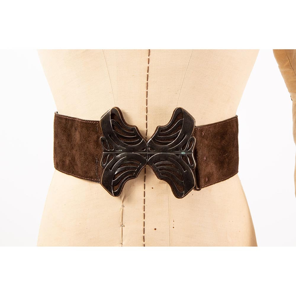 Sold at Auction: A Mickey Mouse belt buckle, & a YSL belt buckle