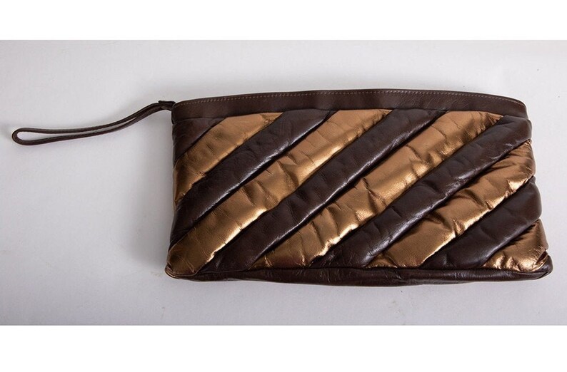 Vintage 1970s bronze puffy leather oversized clutch image 1