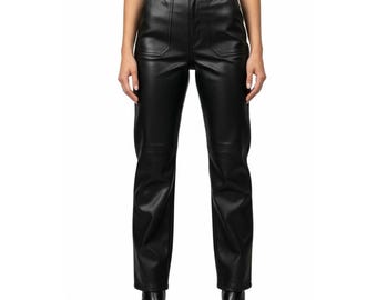 May include: Black leather pants with a high waist and front pockets. The pants have a straight leg design and are worn with black boots. The pants are made of a smooth, shiny material.