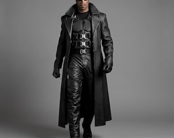 May include: A figure wearing a long black leather trench coat over a tactical vest with multiple buckles, black leather trousers, and black gloves. The figure has short hair and wears dark, narrow sunglasses, standing in a forward-facing pose.