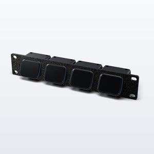 May include: A black rack-mount panel featuring four square, glossy black push-button switches arranged in a horizontal row. The panel has a textured finish and includes mounting holes on both ends for secure installation into a standard equipment rack.