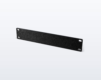 May include: A rectangular black rack blanking panel with a textured finish. The panel features two mounting holes on each of the short ends, designed for installation into a standard equipment rack system for covering empty rack spaces.