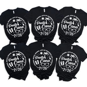 May include: Six black t-shirts with a white circular graphic that reads "Punta Cana 2026". The design includes sunglasses, flip-flops, palm trees, and the words "Friends, Beach, Drinks, Lots of Memories and Laughter".