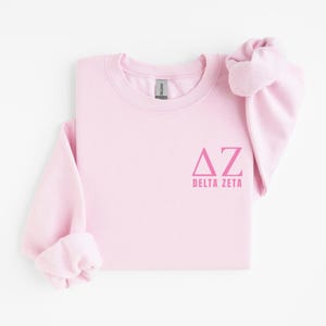 Lizenzierter Delta Zeta DZ Pullover mit pinkfarbenen Buchstaben, Geschenkidee für die Kennenlernwoche, Geschenk für die Mentorin/das Mentorkind, Geschenkidee für die Kennenlernwoche, Geschenkidee für die nächste Kennenlernwoche