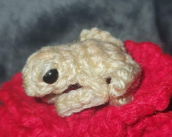 Coquí tejido a crochet