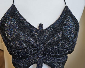 Top vintage de mariposa con cuentas de Cache. El interior es 100% seda.