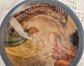 Vintage porcelain collector plate titled "Die Gabe" (The Gift) by Sulamith Wülfing