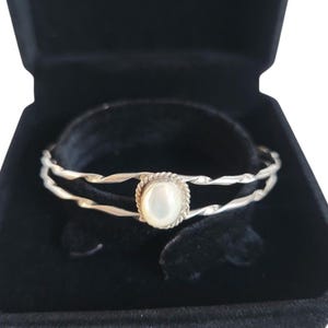 Sterling Silver and Mother of Pearl Bracelet | Twisted Bangle Design