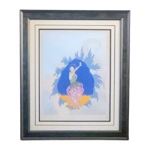 May include: Framed art print featuring a stylized dancer with a blue backdrop and a yellow base. The dancer is depicted with a green and pink outfit, arms raised. The artwork is framed in a dark gray frame with a white mat.