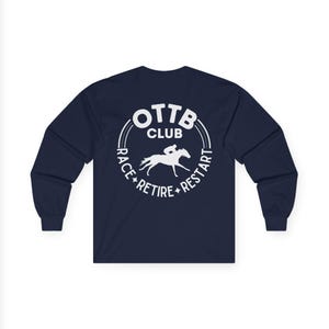 May include: A navy blue long-sleeve shirt featuring a white graphic of a horse and rider inside a circle with the text "OTTB CLUB RACE + RETIRE + RESTART". The shirt has a crew neck and long sleeves.