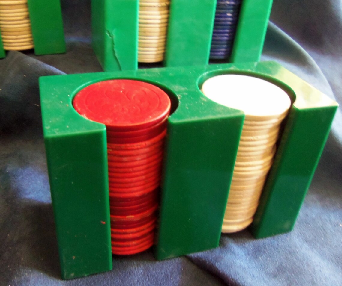 Red, White, and Blue Poker Chips in Plastic or Bakelight Holders