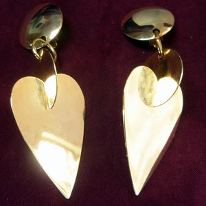 Gold and Silver Earrings Worn in New Orleans during Mardi Gras