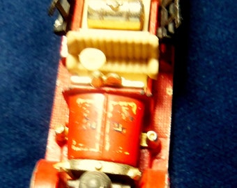 Two (2) Vintage Small Firetrucks, A 1980 Hot Wheels and a 1982 Matchbox  which is missing its Ladder,
