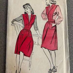 May include: Vintage Advance Pattern 3427. The pattern features illustrations of two women wearing a red dress with a collared top and pockets. The pattern is size 15, with a bust of 33 inches and a hip of 36 inches. The price is 25 cents.