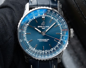 Reloj Breitling Navitimer vintage de 41 mm con esfera azul, caja de acero y correa de cuero, ideal para hombre o como regalo.