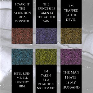 May include: Set of six bookmarks with dark backgrounds and floral patterns in red, purple, and yellow. Each bookmark has a black banner with white text, including phrases like "I Caught the Attention of a Monster" and "The Man I Hate Is My Husband."