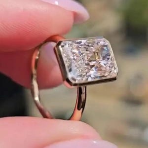 3CT Radiant Cut Moissanite Engagement Ring: 14K Yellow Gold Bezel Solitaire
