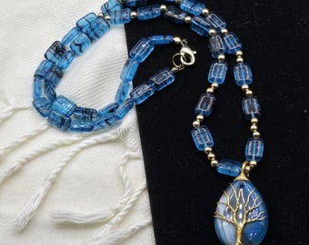Wire Wrapped Tree of Life Quartz Pendant: Blue Glass Bead Necklace