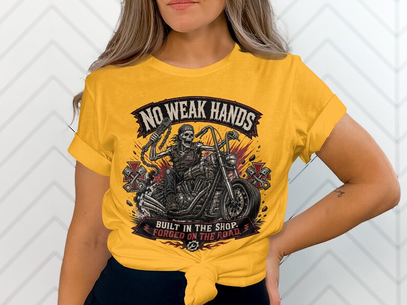 Yellow t-shirt with graphic of skeleton on motorcycle and text.