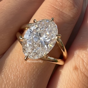 Solitario de caña dividida con halo oculto en oro amarillo de 18 quilates: joyería de compromiso de moissanita ovalada de 4,50 quilates