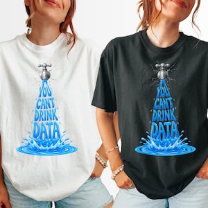 May include: A white t-shirt and a black t-shirt, each featuring a graphic of a silver faucet dripping blue water that forms the text YOU CANT DRINK DATA. The water splashes at the base, creating a ripple effect in shades of bright blue.